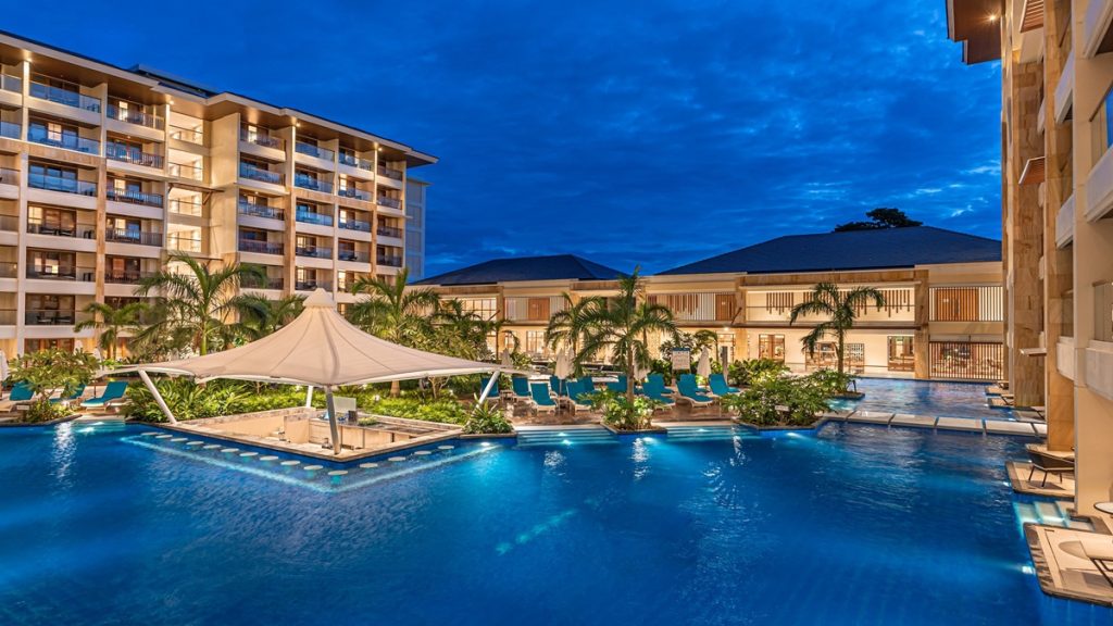 Henann Tawala Resort in Bohol with beachfront pools, palm trees, and modern tropical architecture